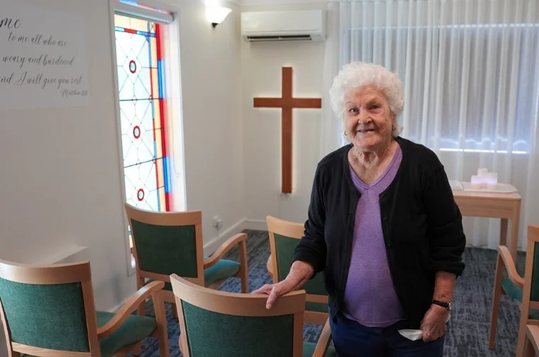 Reclaimed pine cross inside Wishart chapel